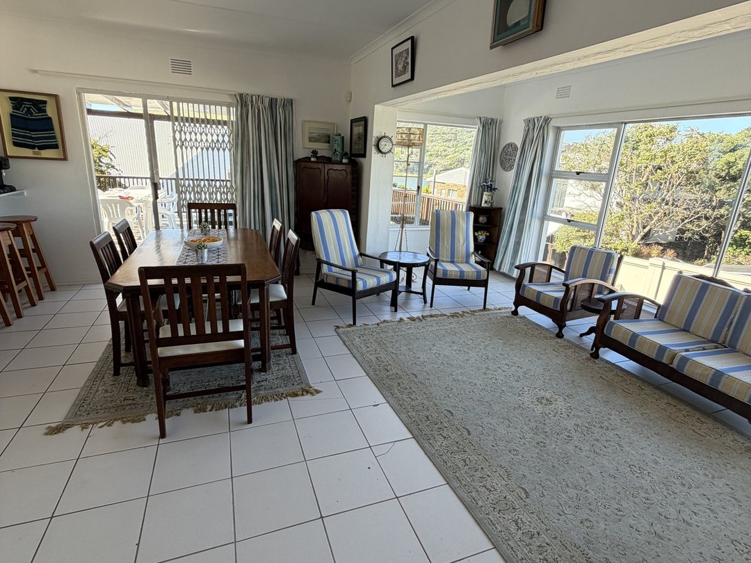 A coastal living and dining room — the original photo